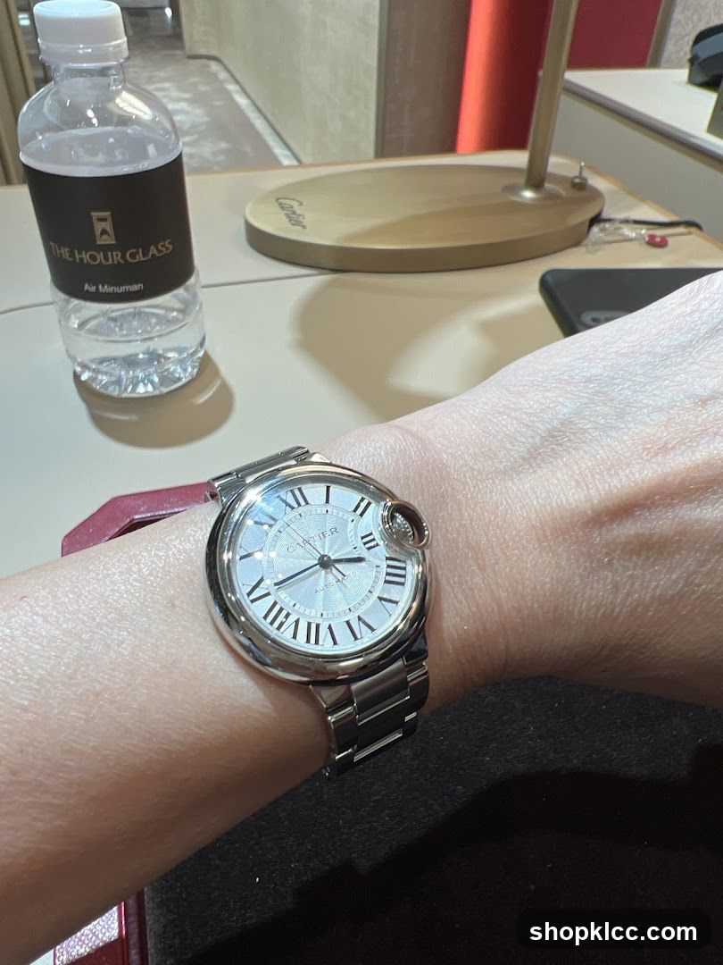 Cartier Watch and Water Bottle