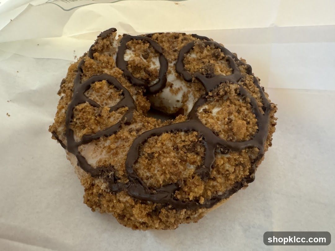 Donut with Chocolate Drizzle and Crumble Topping