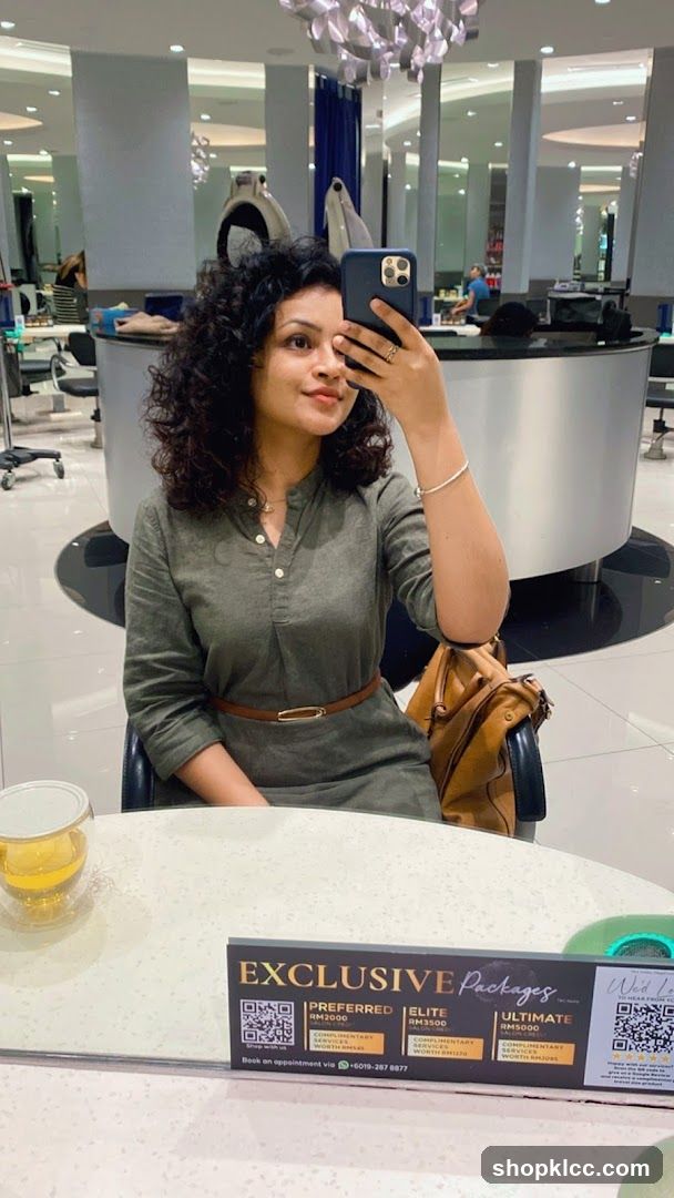 Salon Interior with Woman Taking Selfie