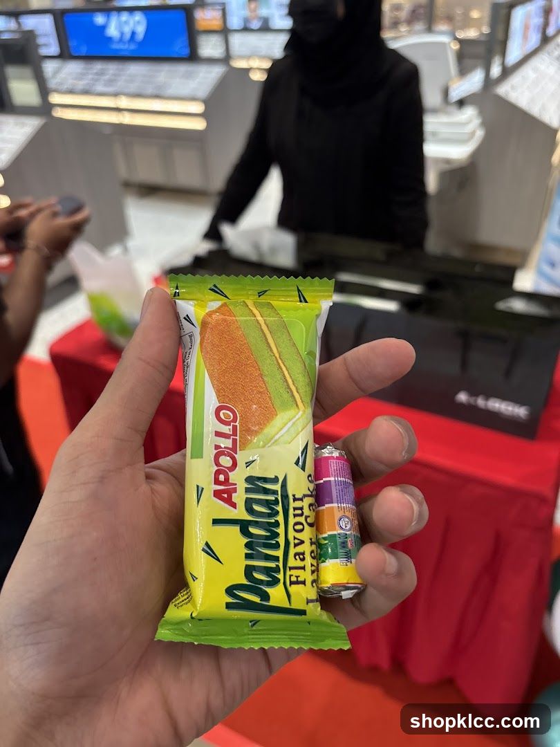 Hand Holding Apollo Pandan Flavor Layer Cake