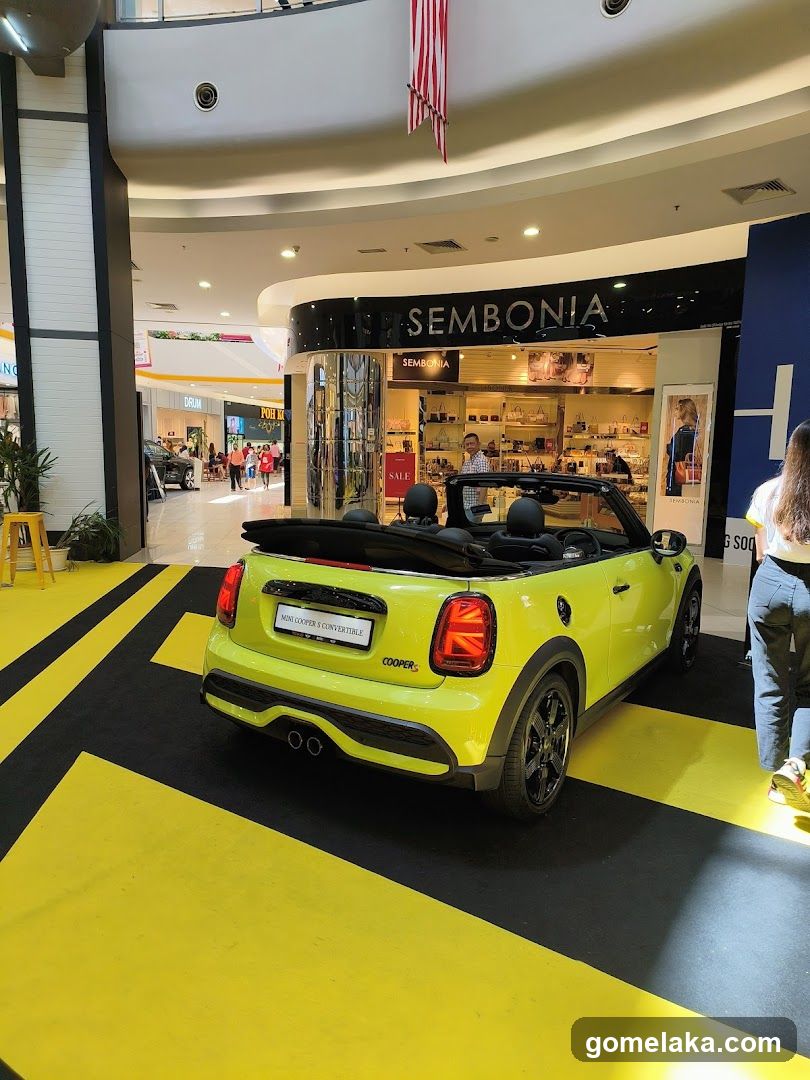 Interior of shopping mall with car display