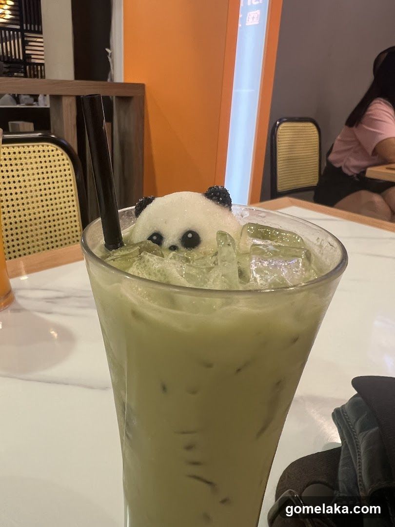 Panda-themed iced drink in café