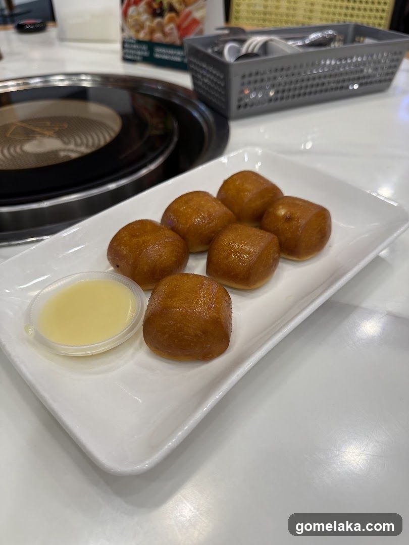Dessert Plate with Buns and Sauce