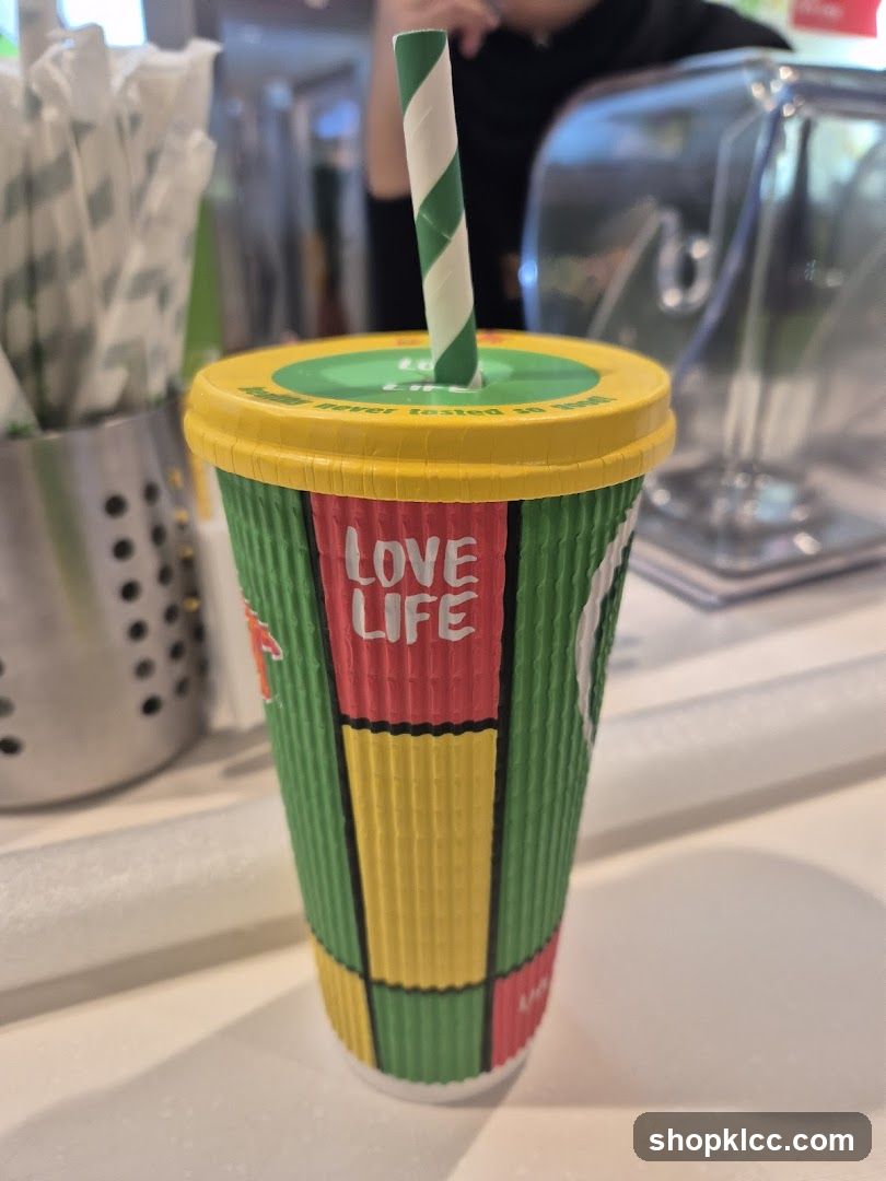 Drink cup with straw