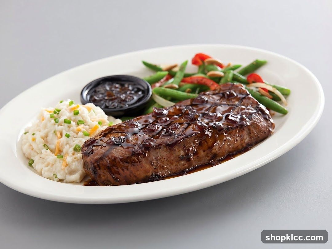 Sauced Steak with Mashed Potatoes and Green Beans
