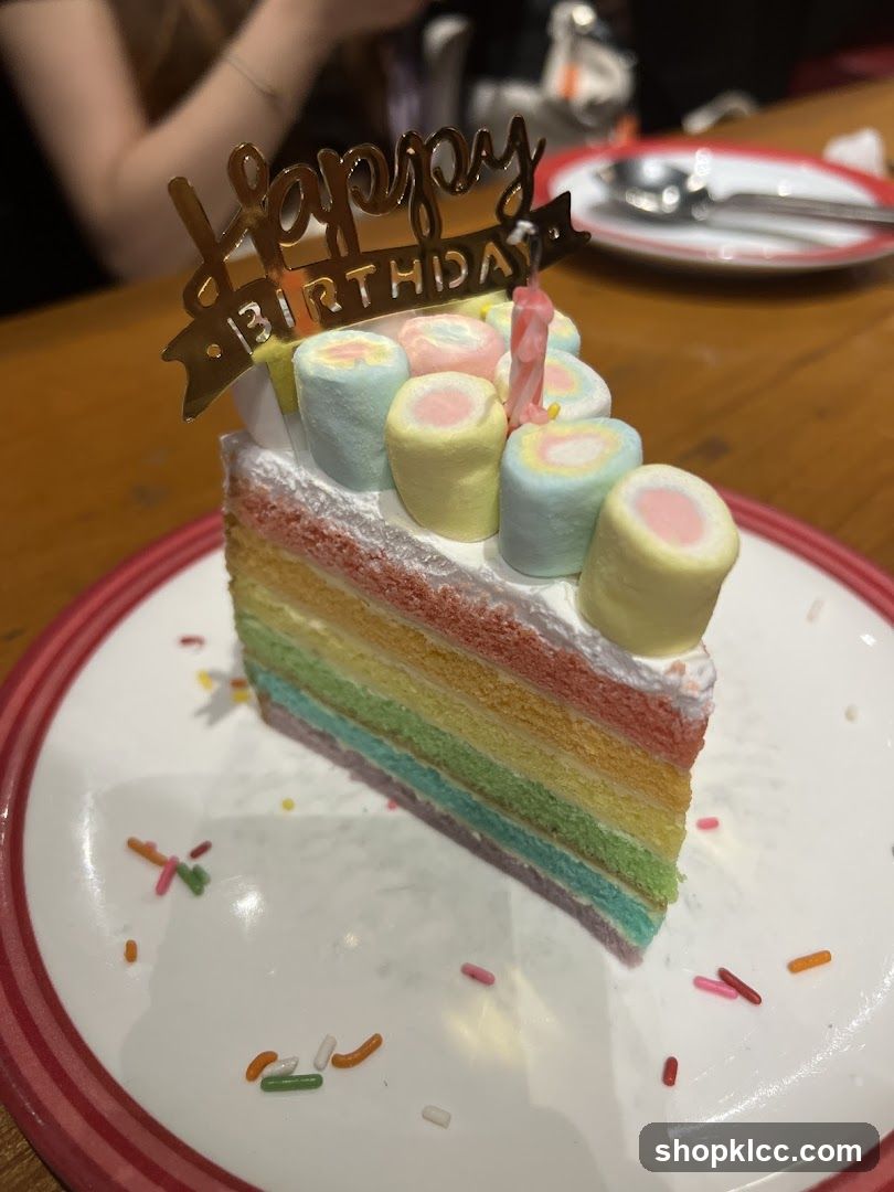 Rainbow Layer Cake Slice