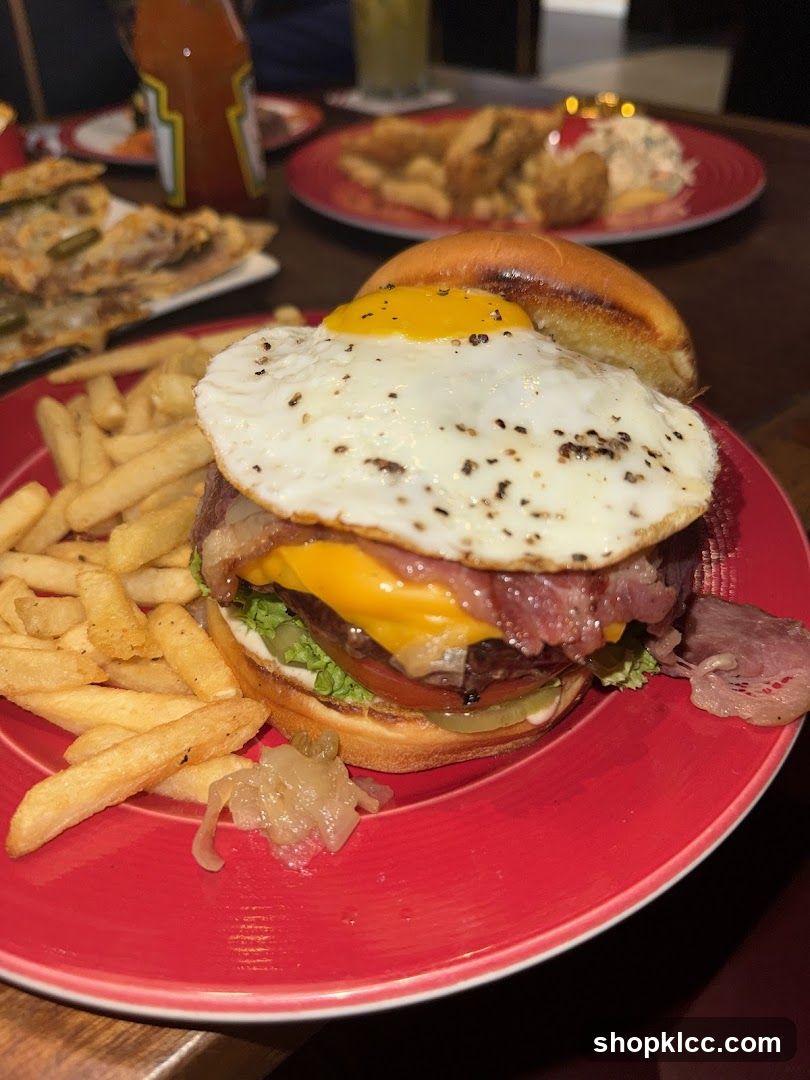 Loaded Burger with Fried Egg and Fries