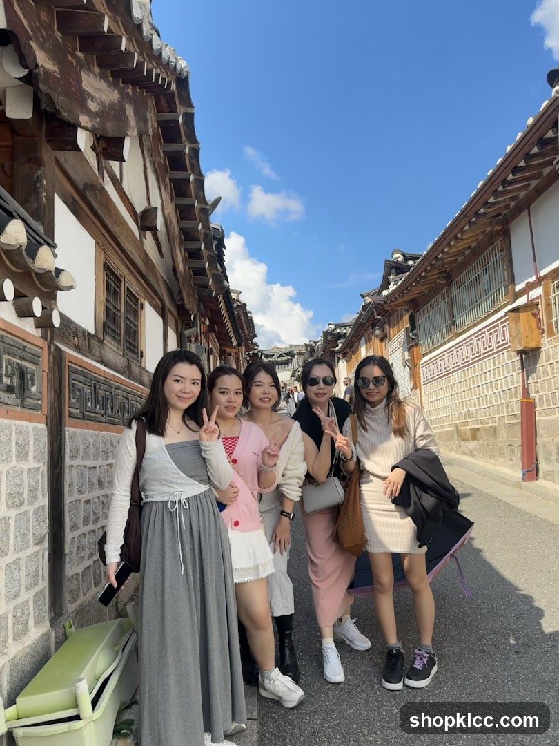 Group of friends posing in a traditional street