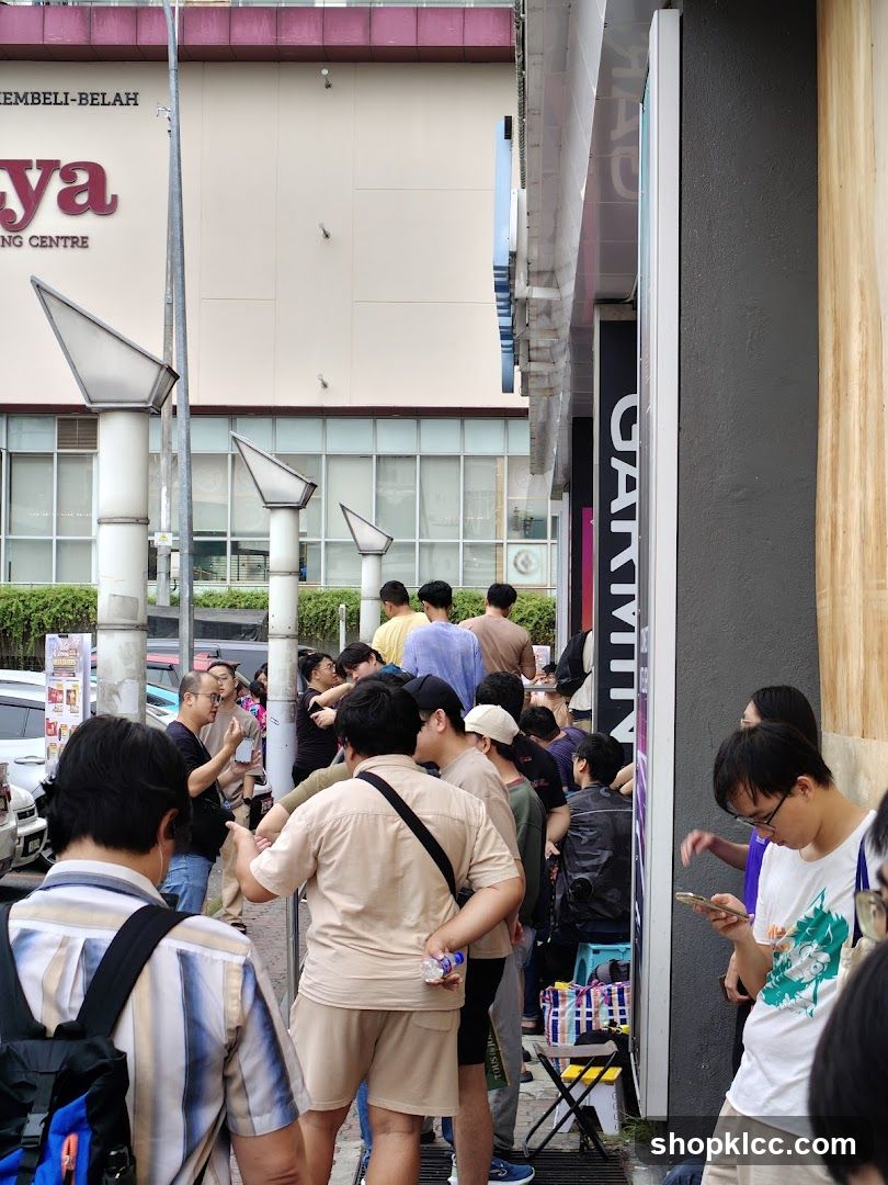 People queuing outside a store