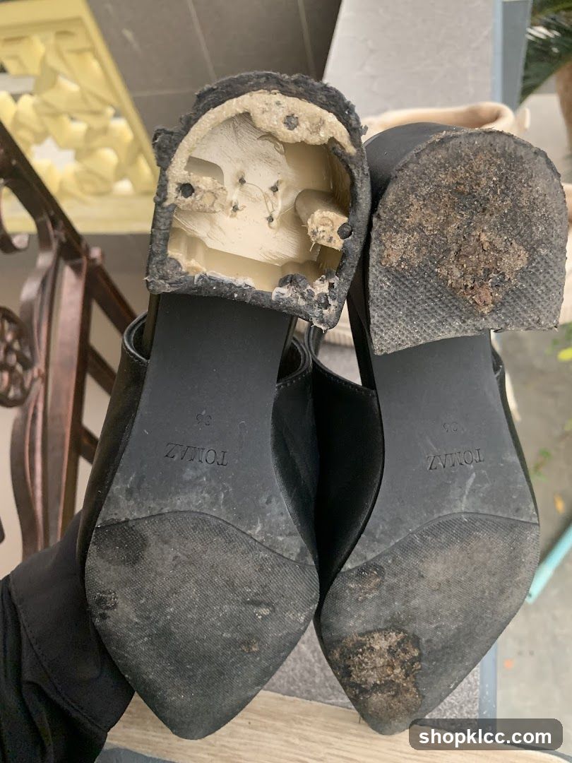 Damaged Black Heels