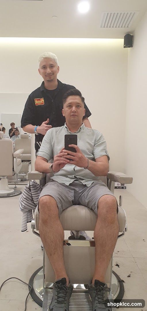 Barber giving a haircut