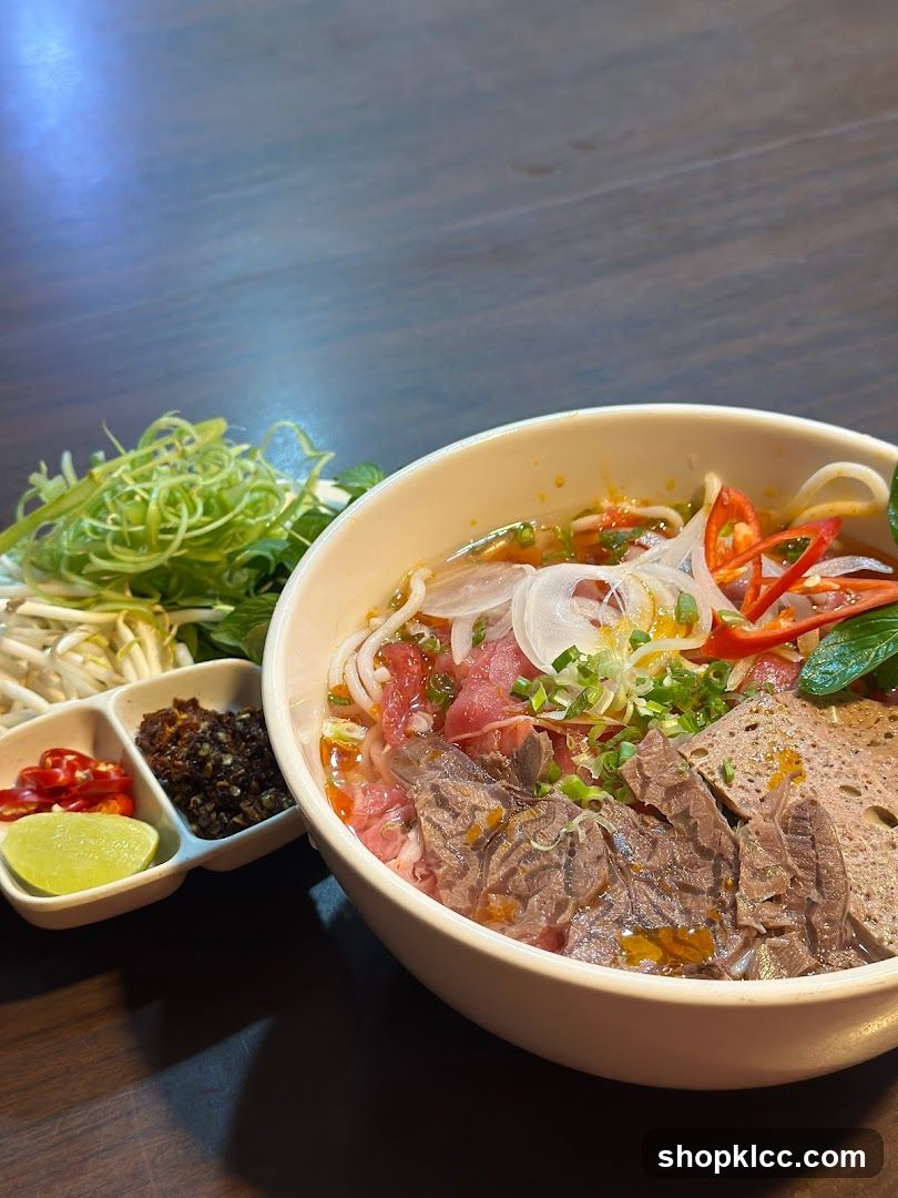Bowl of Pho with Side Dishes