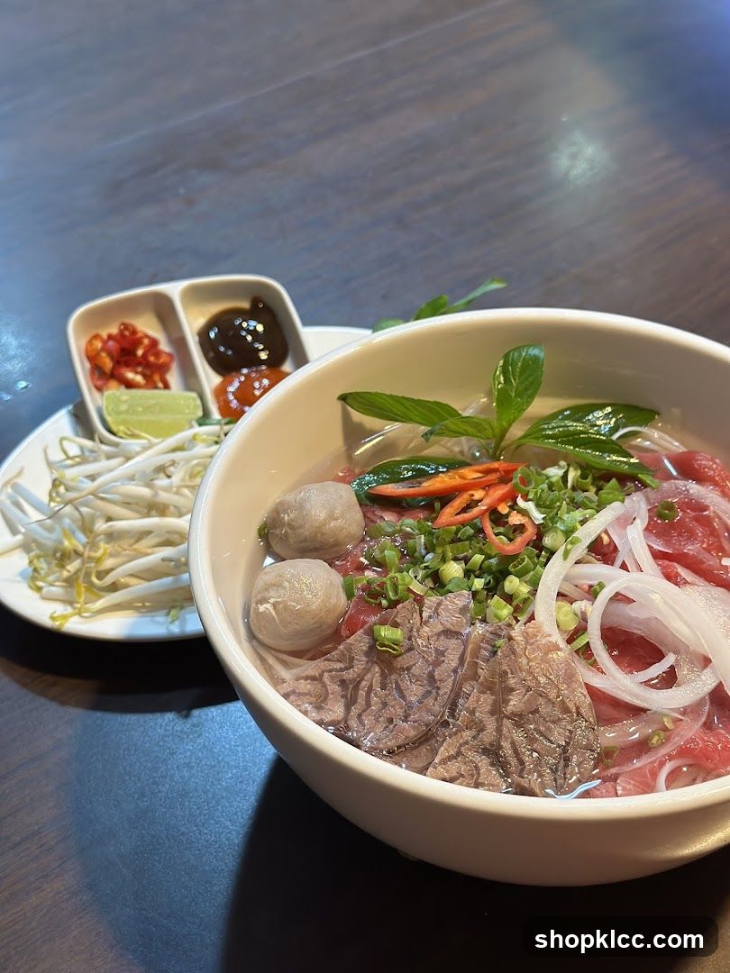 Bowl of Pho with Side Dishes