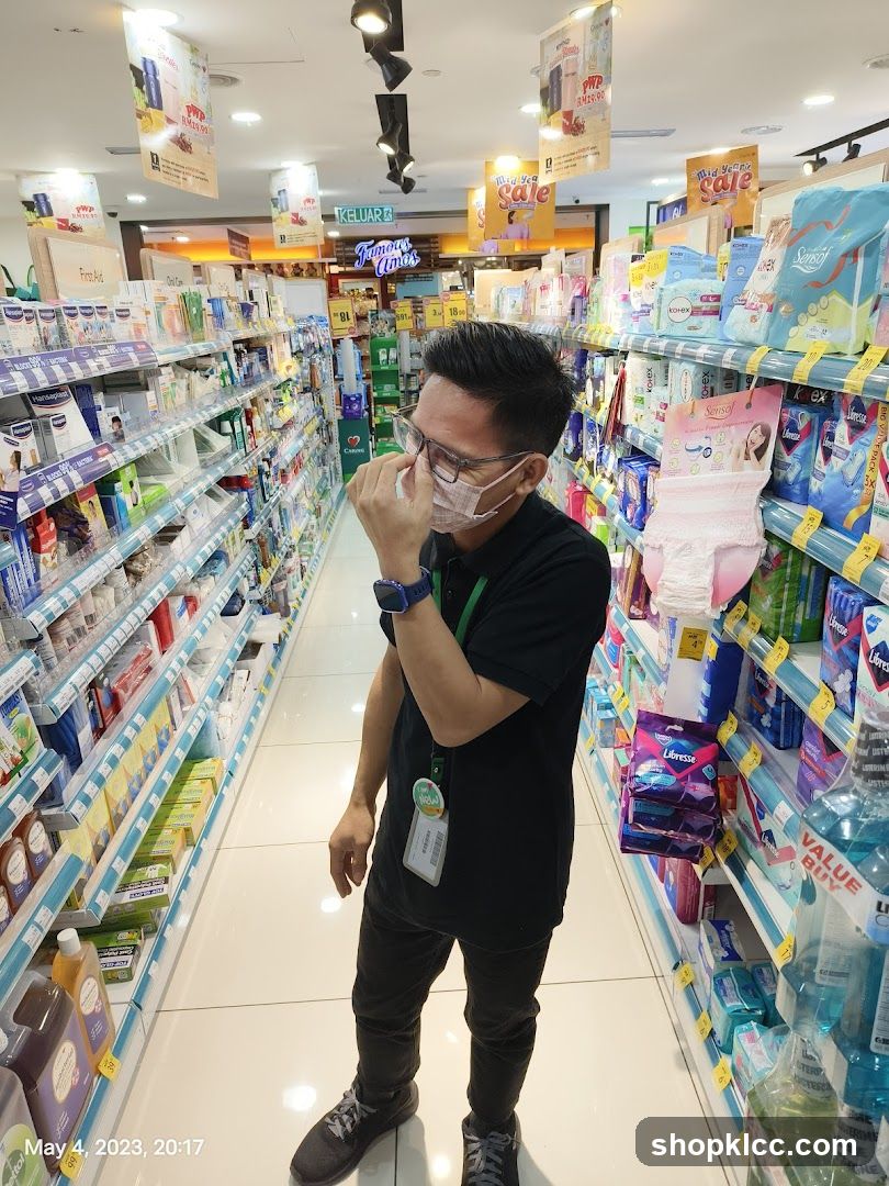 Man in Pharmacy Aisle