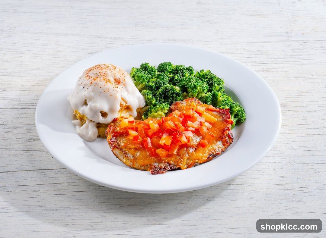 Chicken dish with broccoli and mashed potatoes