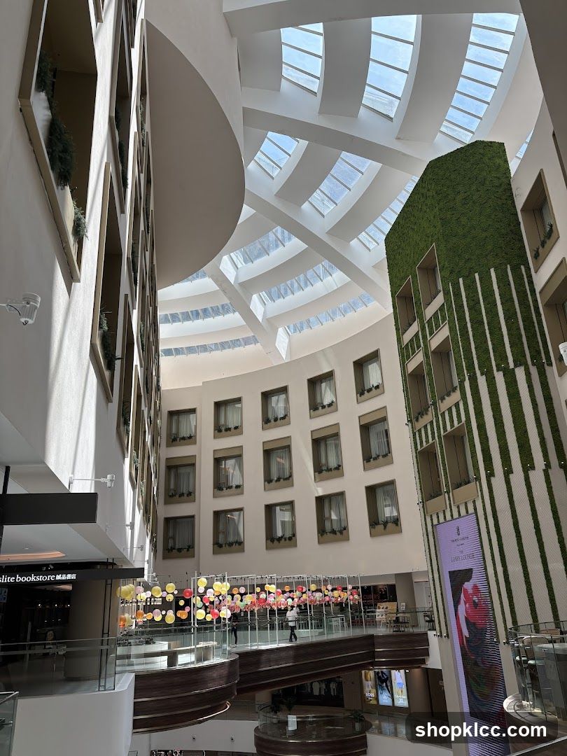 Interior atrium with green wall and skylights