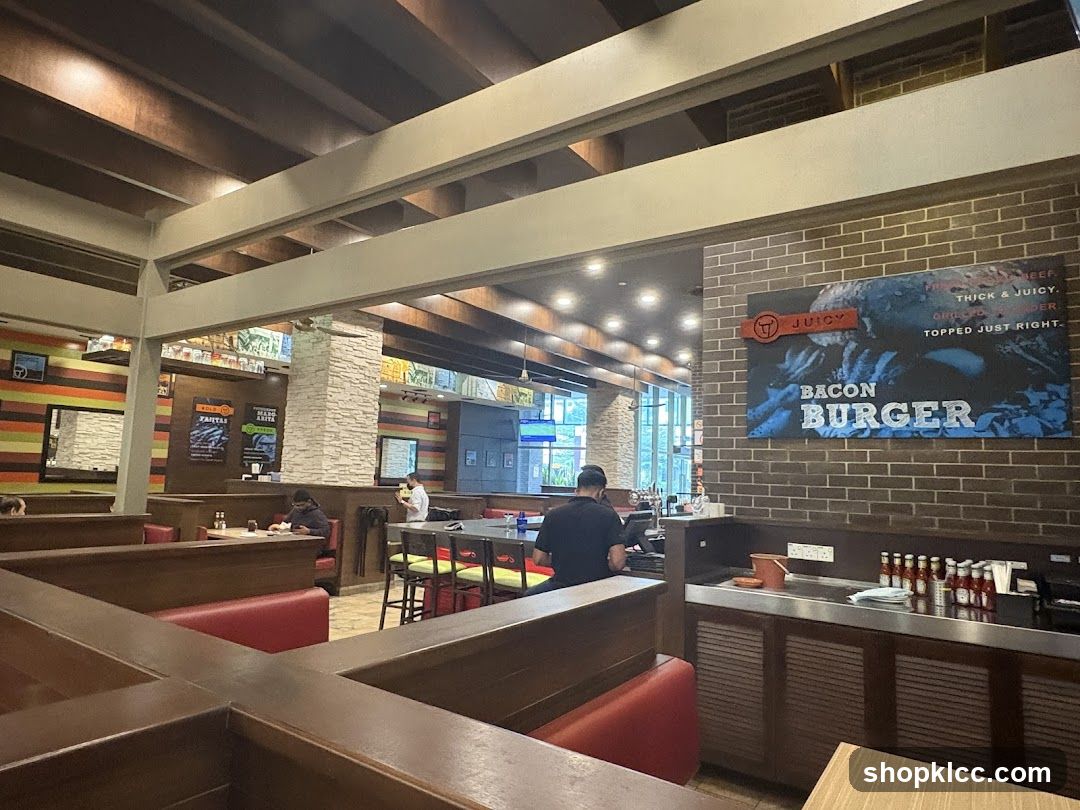 Restaurant Interior with Bacon Burger Advertisement