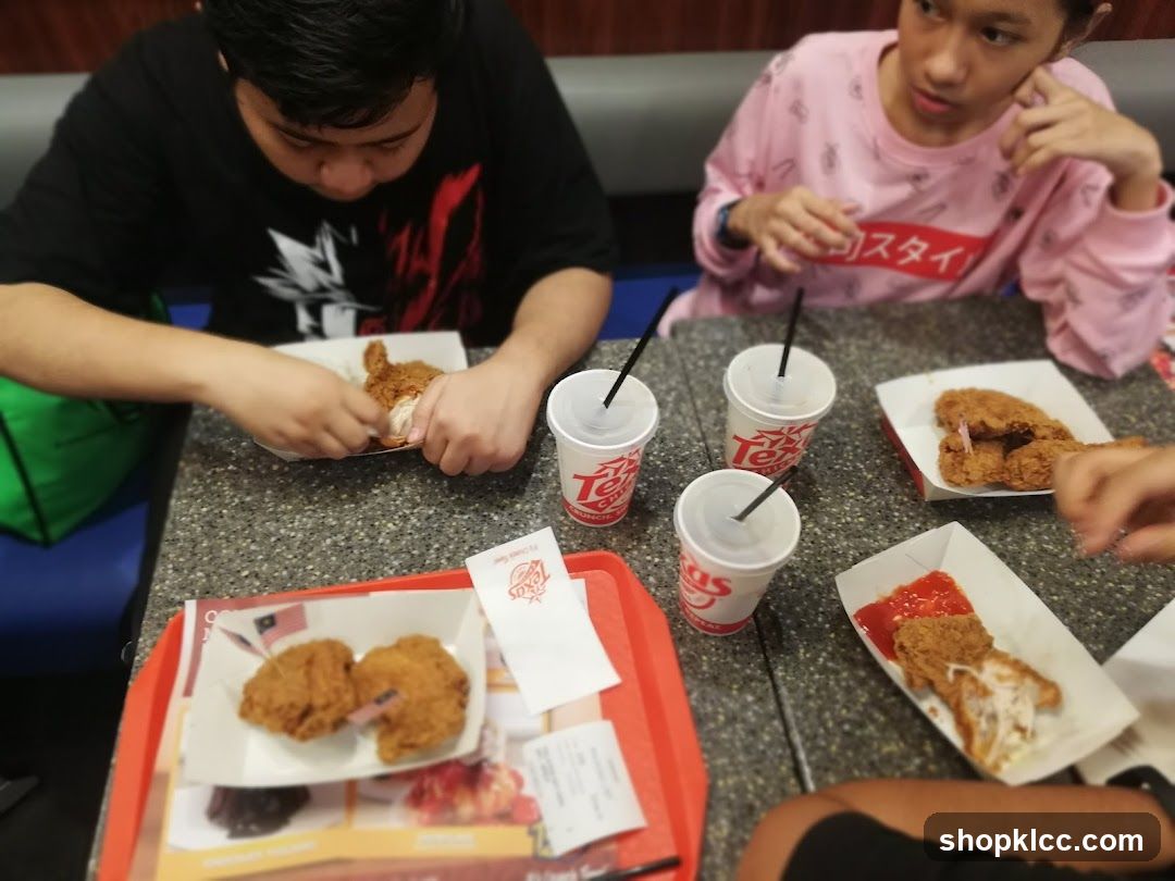 People eating fried chicken