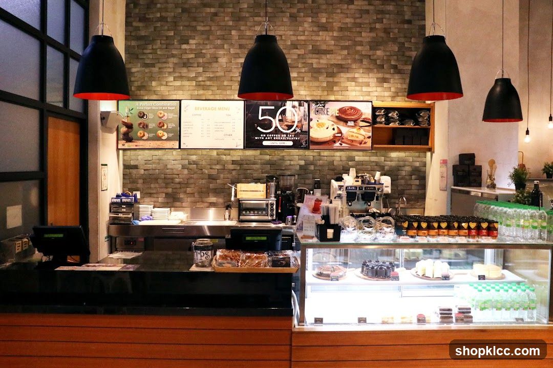 Cafe Counter with Pastries and Drinks