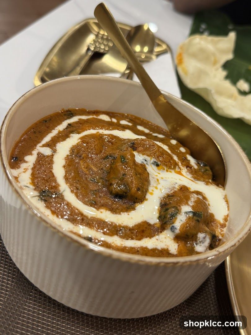Bowl of Curry with Cream Swirl