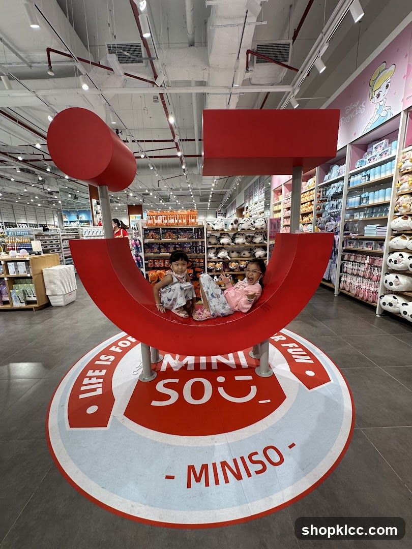 Children on a Miniso display