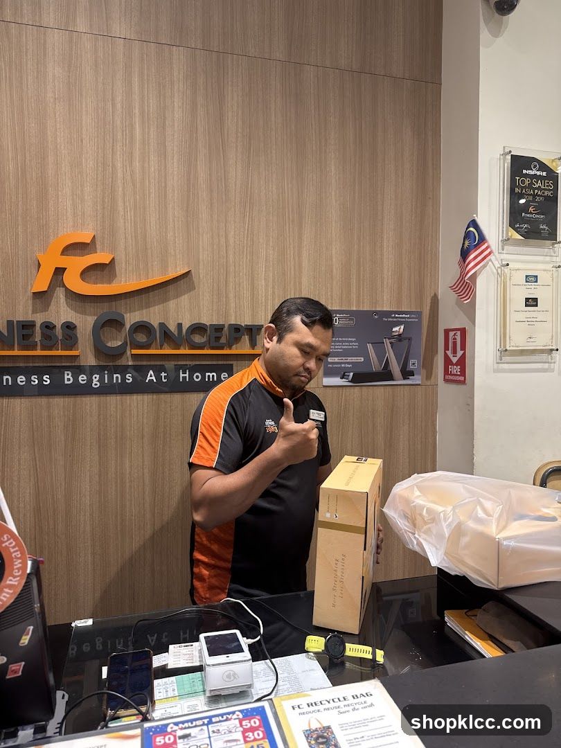 Staff member holding a package
