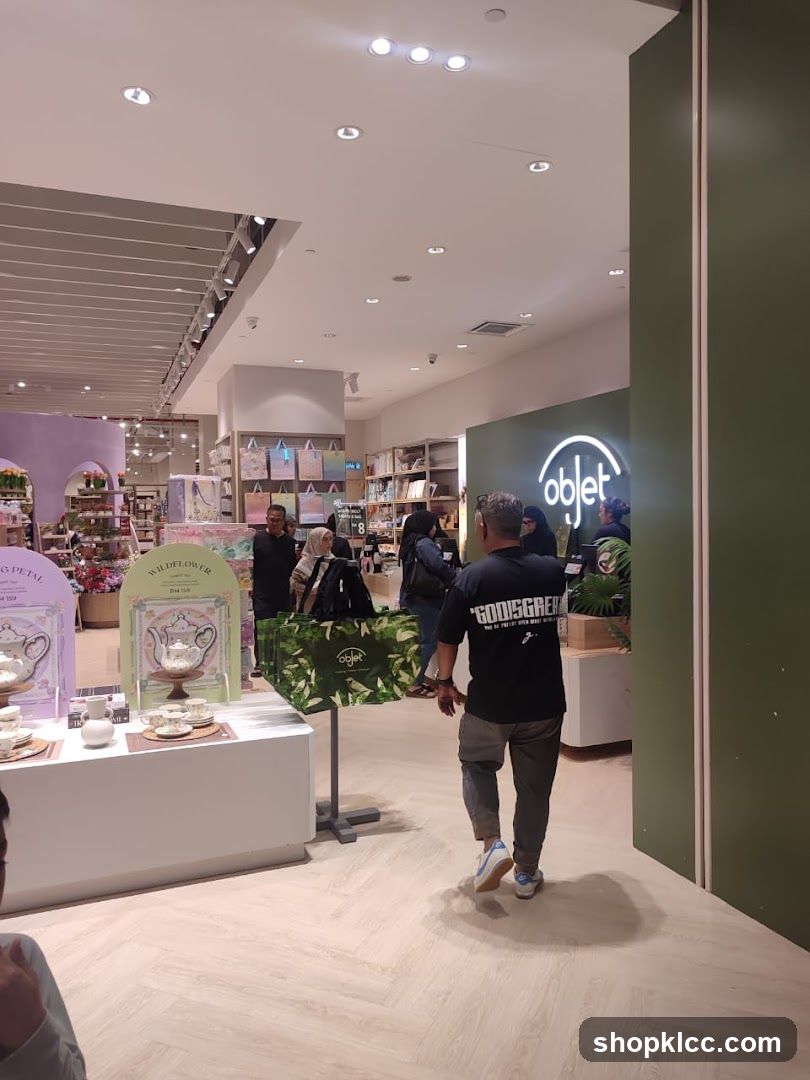 Interior of a store with displays and shoppers