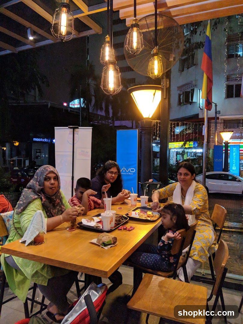 Family Dining at Outdoor Cafe