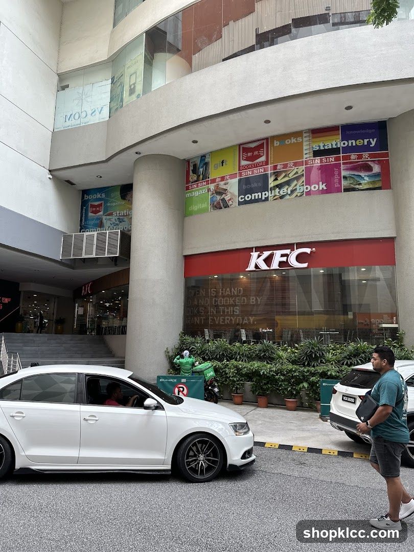 KFC Store Entrance with Adjacent Shops