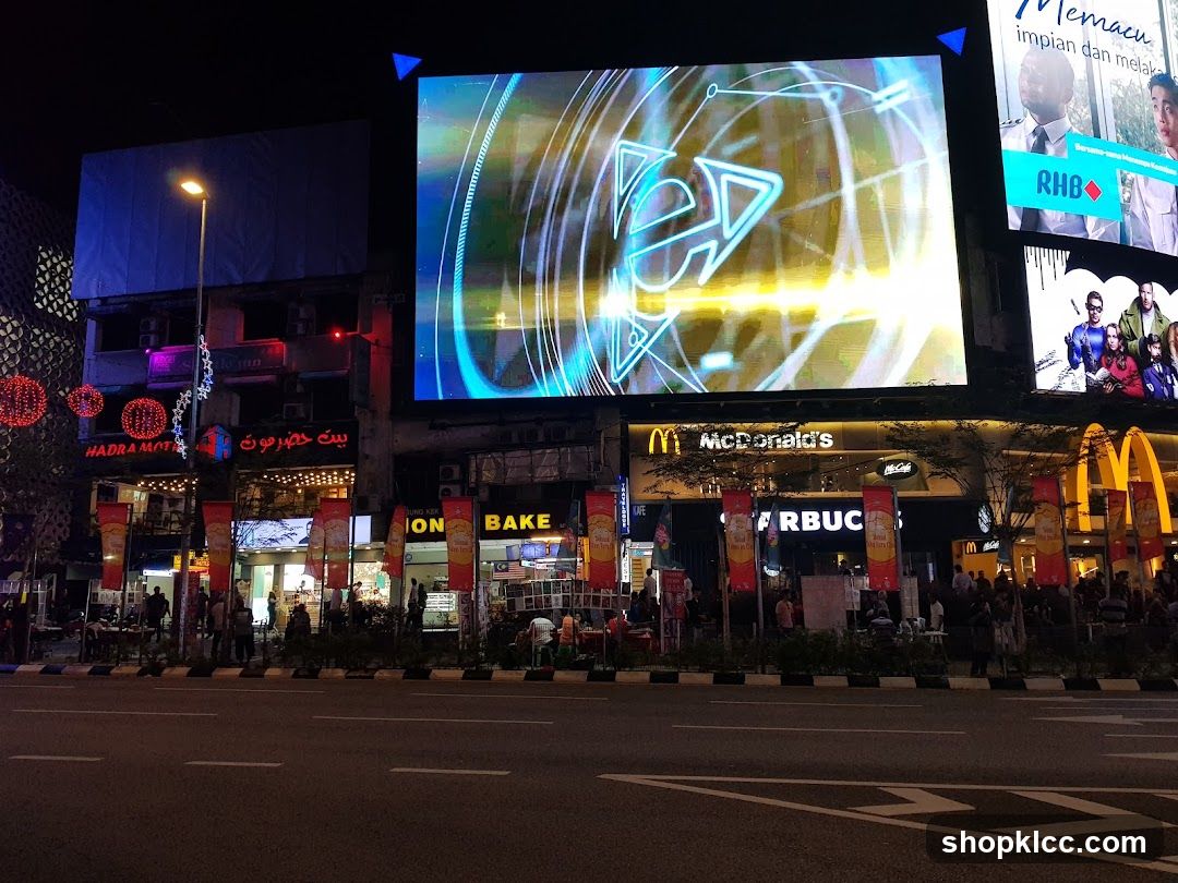 Night Street Scene with Billboards and Shops