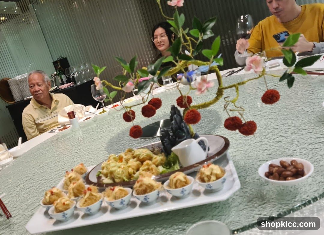 Diners at a table with food