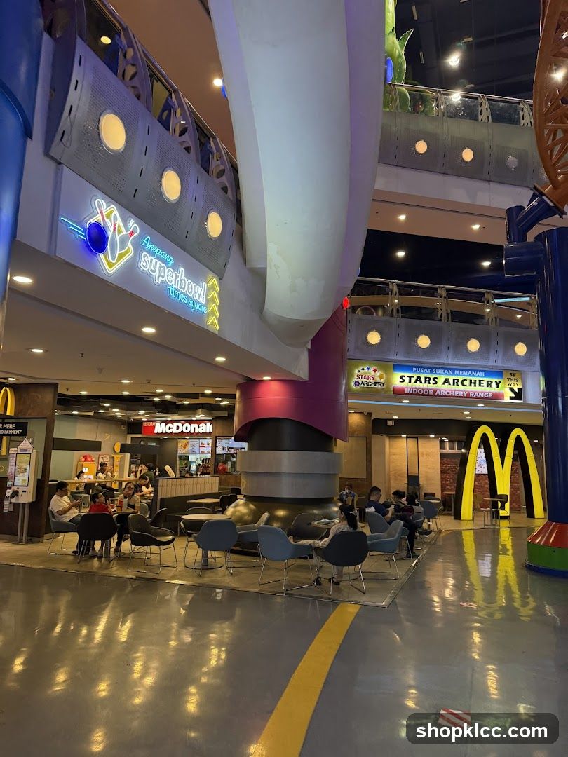 Shopping Mall Interior with Food Court and Entertainment Areas