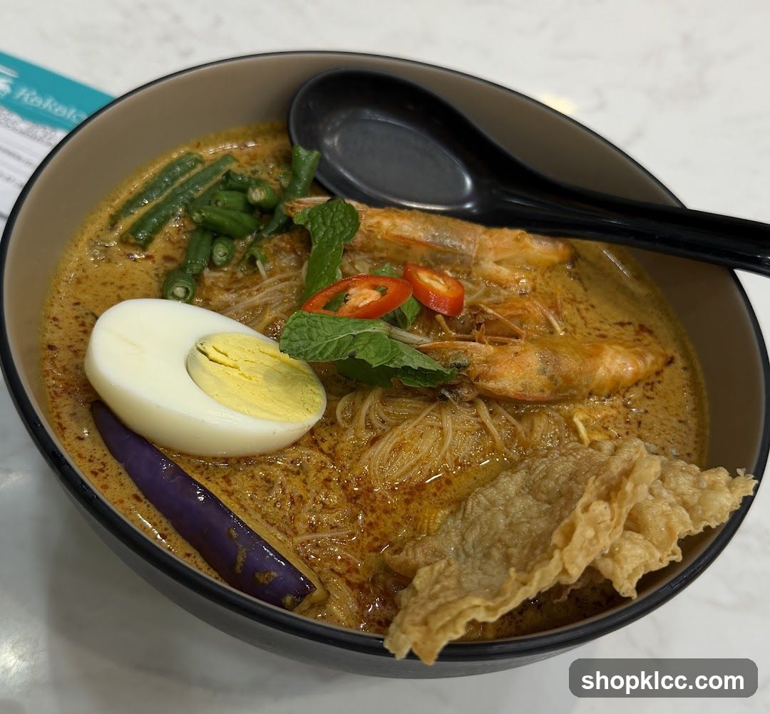 Bowl of Curry Noodles with Shrimp and Egg