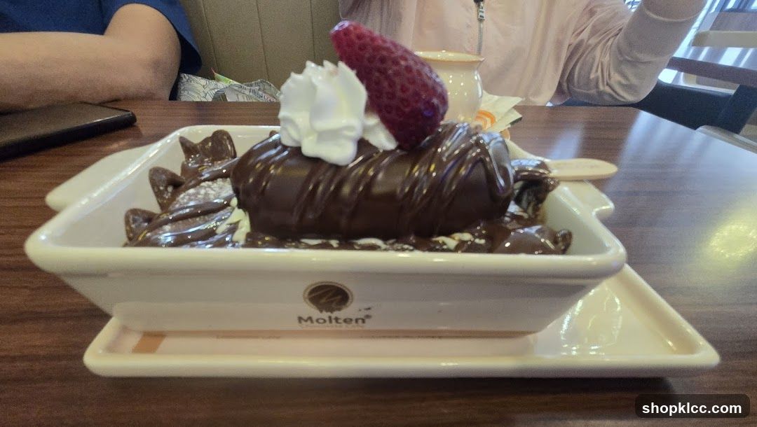 Chocolate Dessert with Strawberry and Whipped Cream