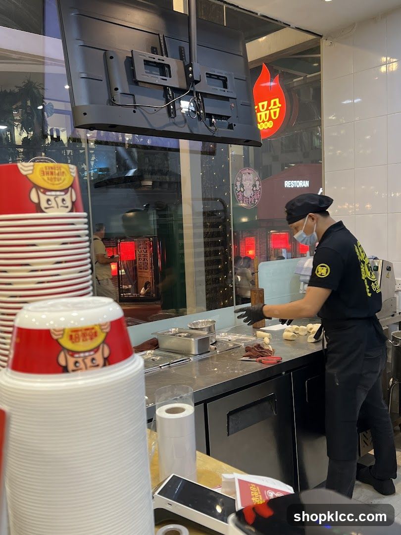 Staff Preparing Food at Counter