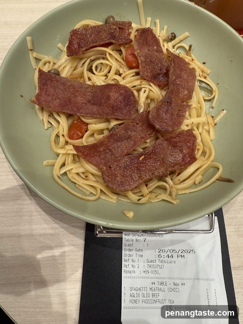 Spaghetti dish with meatballs and beef