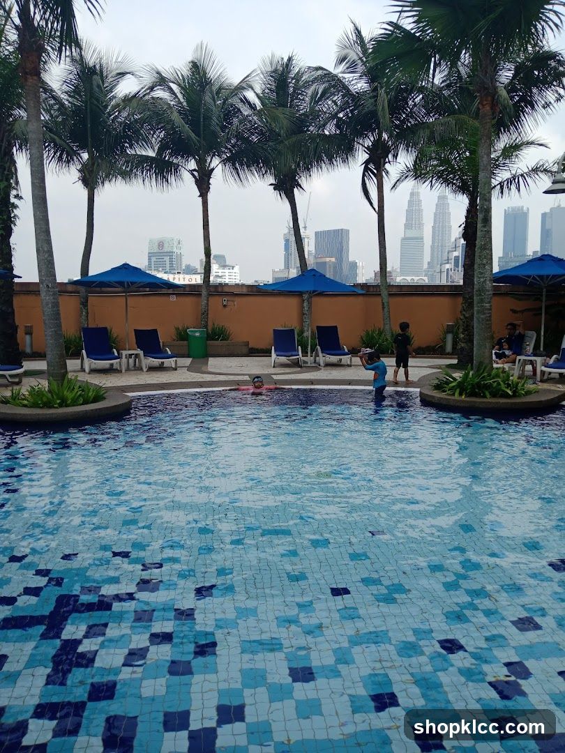 Poolside View with City Skyline