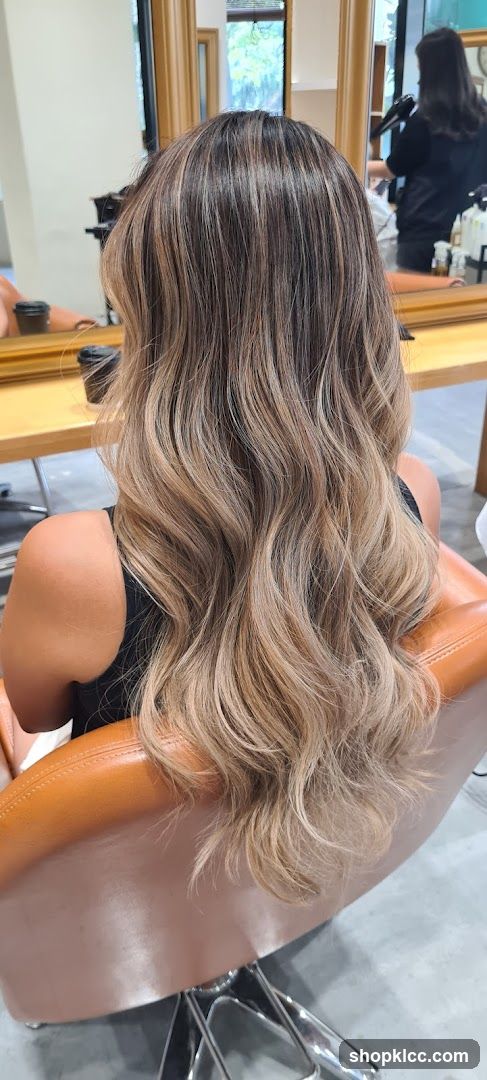 Woman with highlighted hair in salon