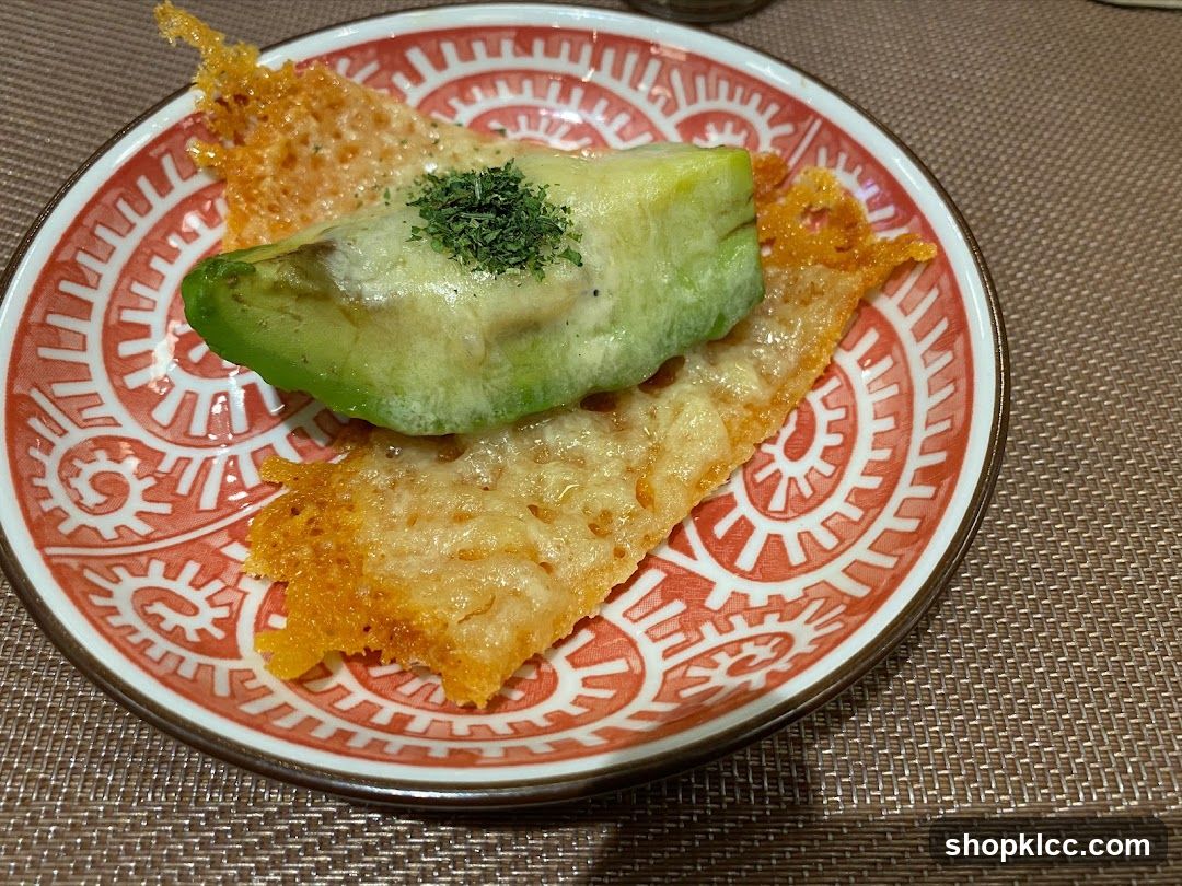 Avocado and Cheese Crisps on Patterned Plate