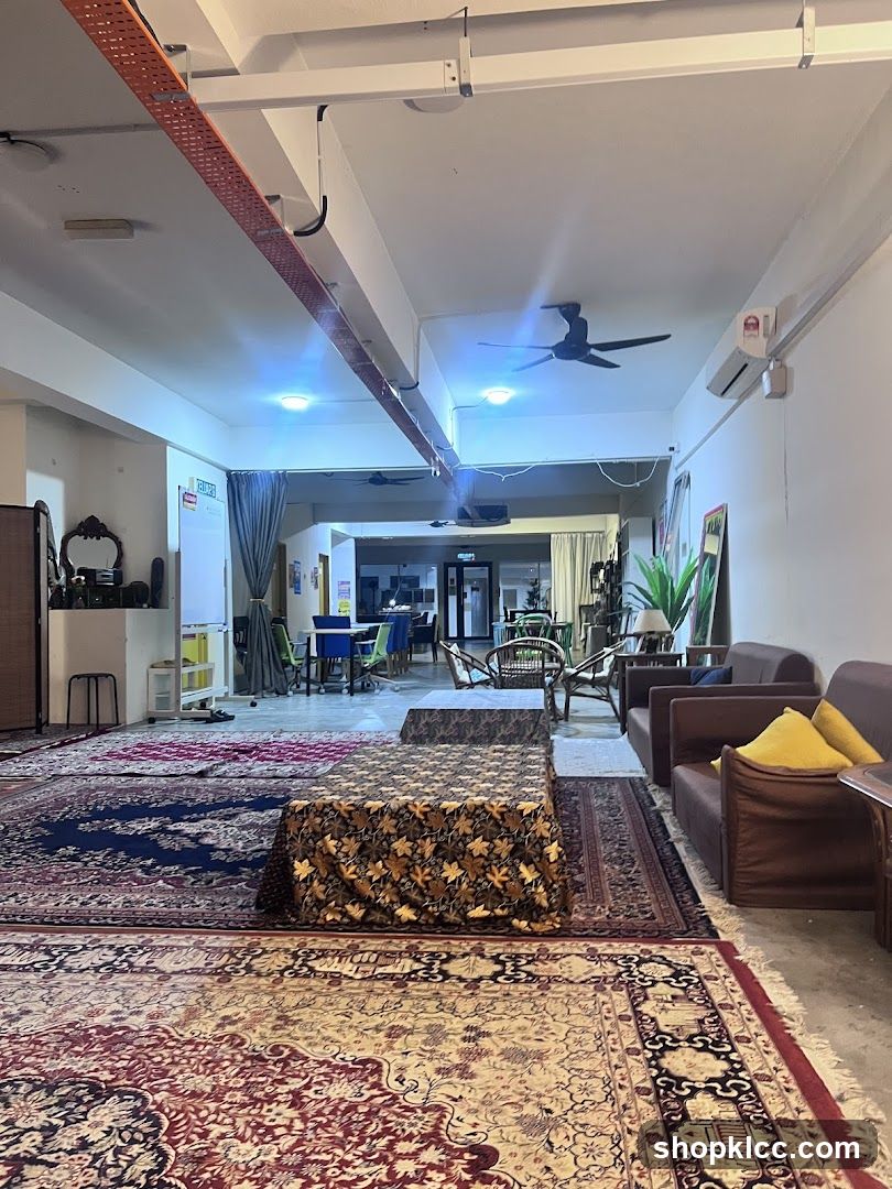 Interior of a lounge area with Persian rugs and seating
