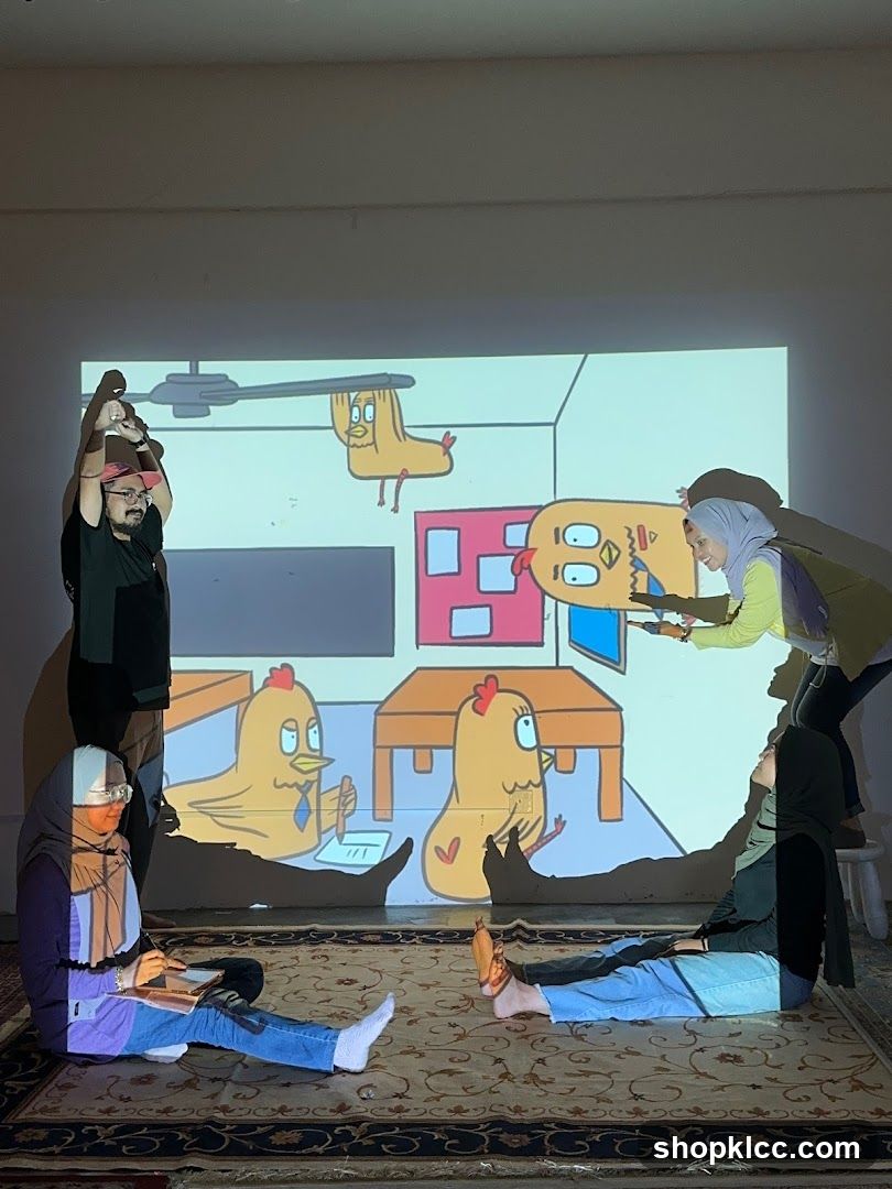 People watching a cartoon projection