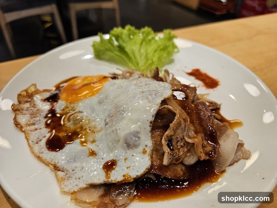 Fried Egg with Meat and Sauce