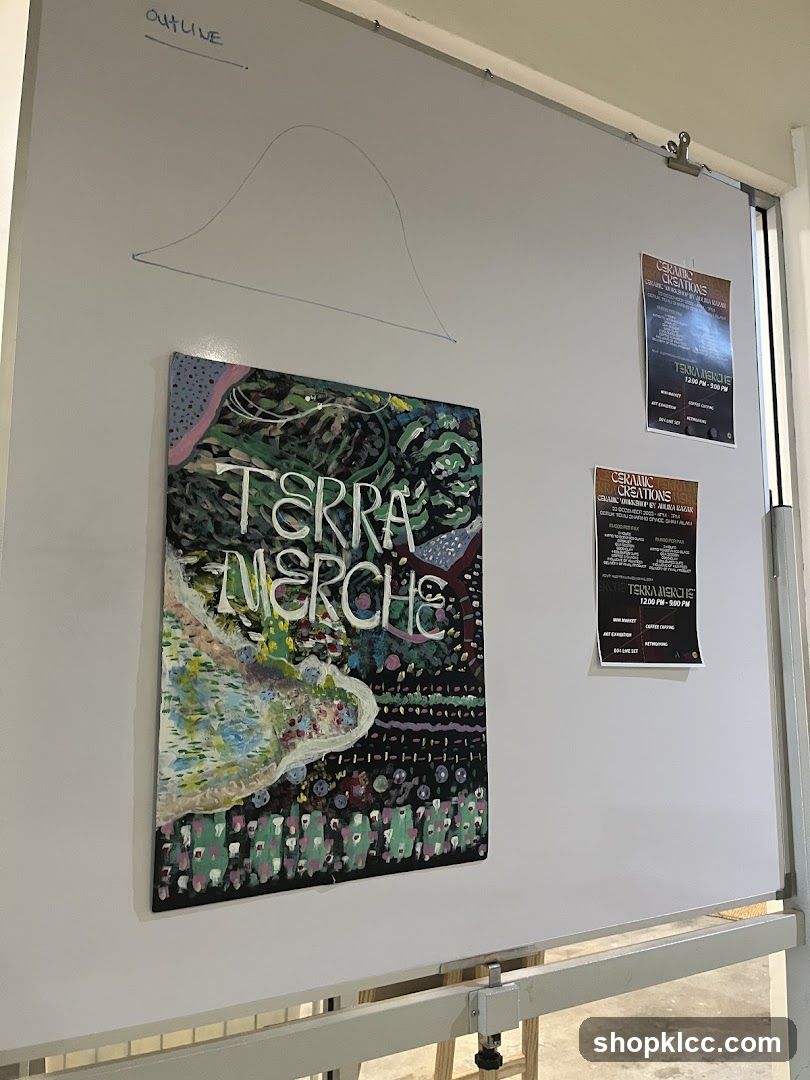 Whiteboard with artwork and flyers