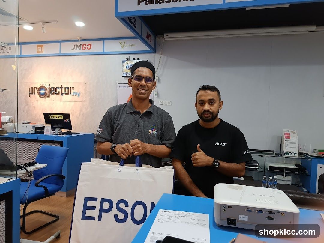 Projector Store Interior with Staff and Products