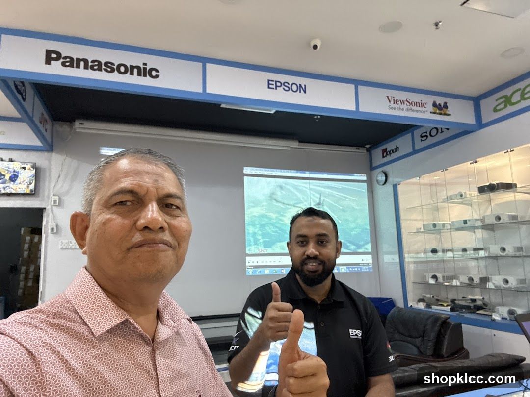 Electronics Store Interior with Staff