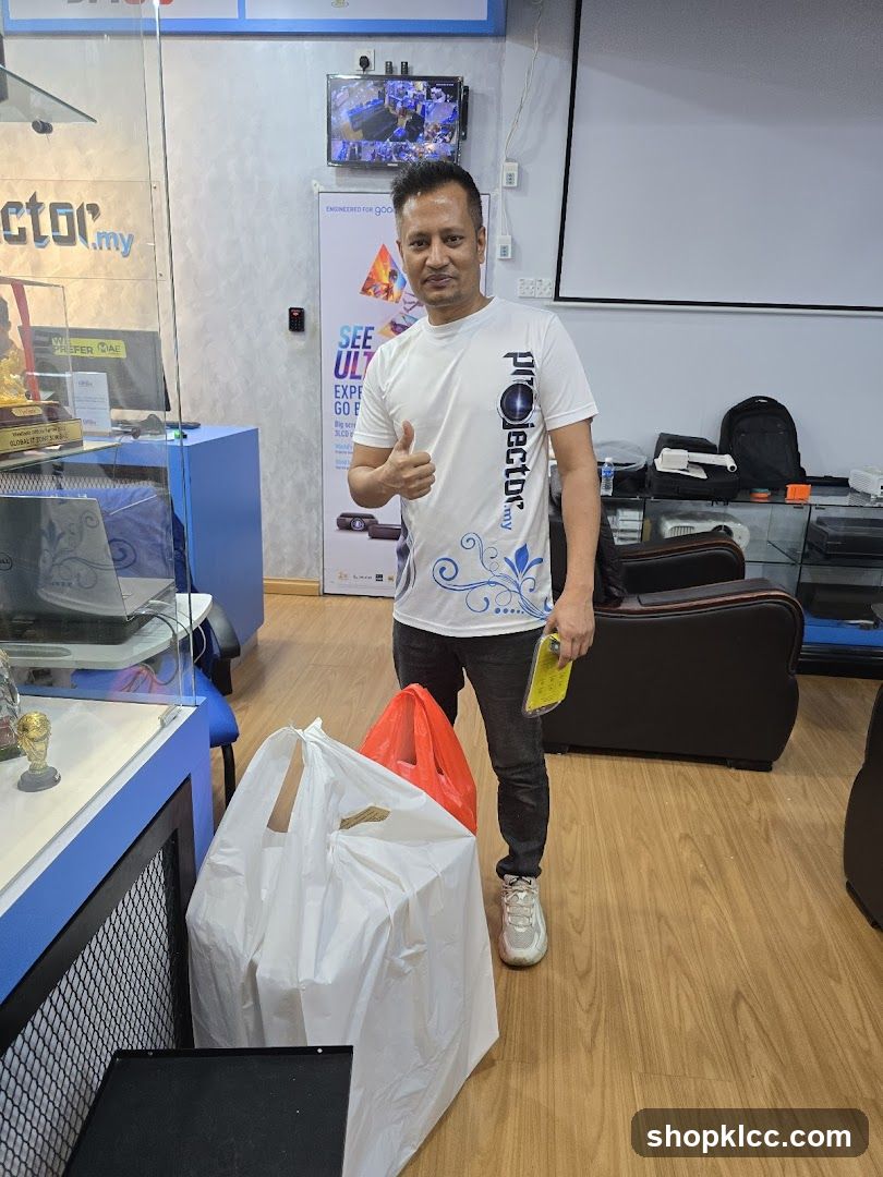 Interior of a shop with shopping bags and staff