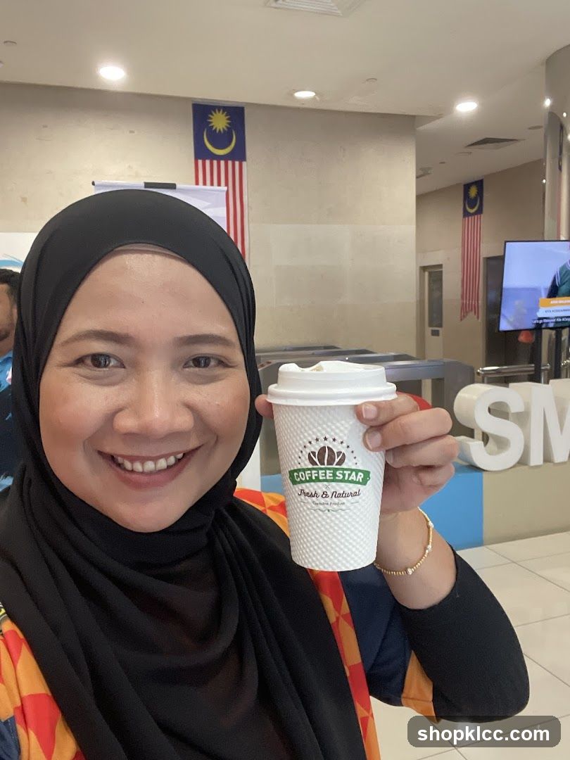 Woman holding a coffee cup