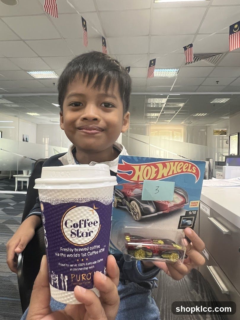 Boy with Coffee and Toy Car
