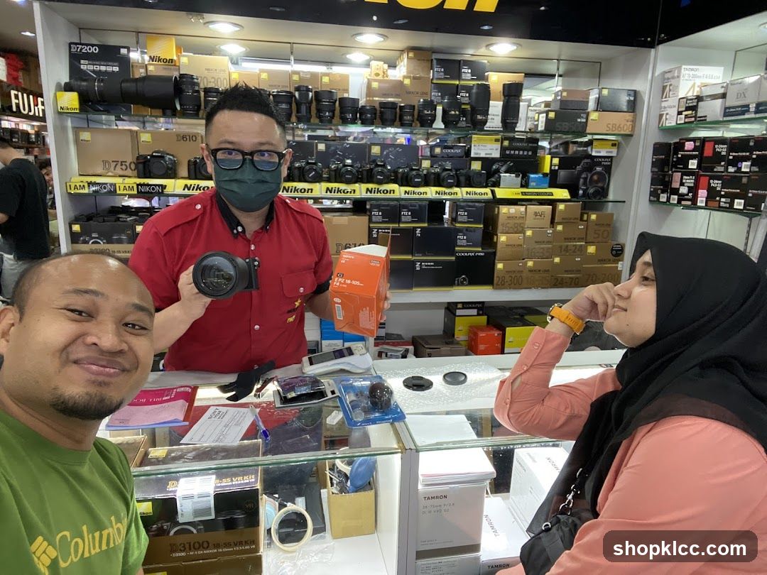 Camera Shop Interior with Staff and Customer