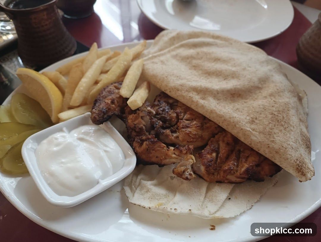 Grilled Chicken Pita Wrap with Fries and Lemon
